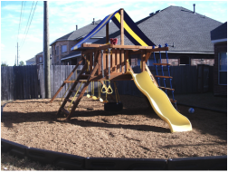 Add 15% extra wood fiber material to account for compression in your playset fall area.