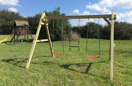All wood a-frame swingset with three swing positions
